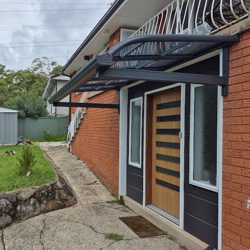 Aluminium Frame Awning Grey 1.5 x 3.0m installed over the front door