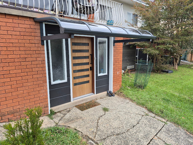 Aluminium Frame Awning Grey 1.5 x 3.0m Installed over the door